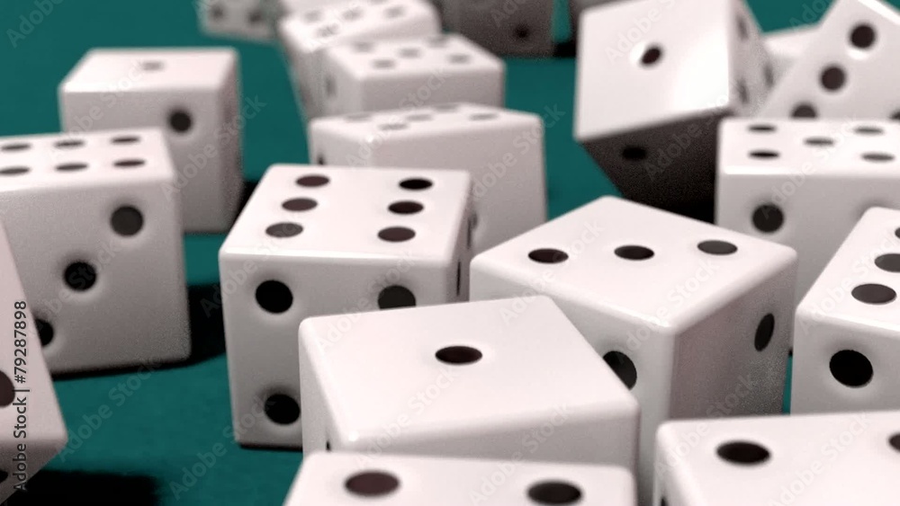 Dice rolling white slow motion closeup DOF on blue felt tabletop Dice rolling white slow motion closeup DOF on blue felt tabletop