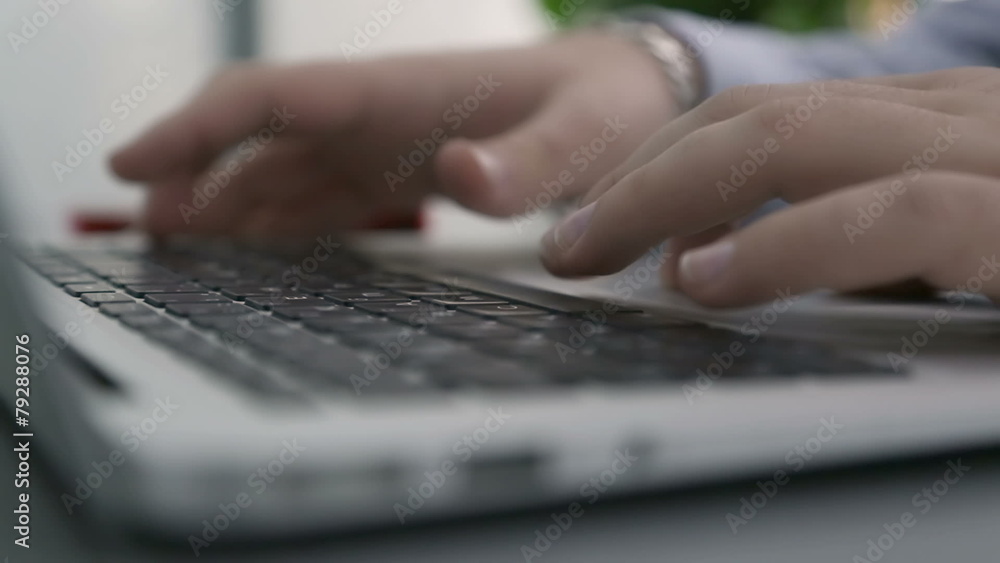 Man is typing on laptop keyboard Shallow depth of field Man is typing on laptop keyboard Shallow depth of field
