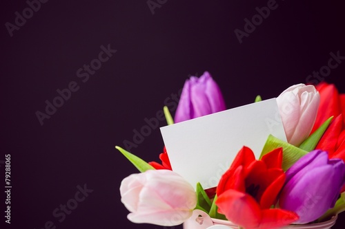 Fototapeta Naklejka Na Ścianę i Meble -  Bunch of tulips and white card