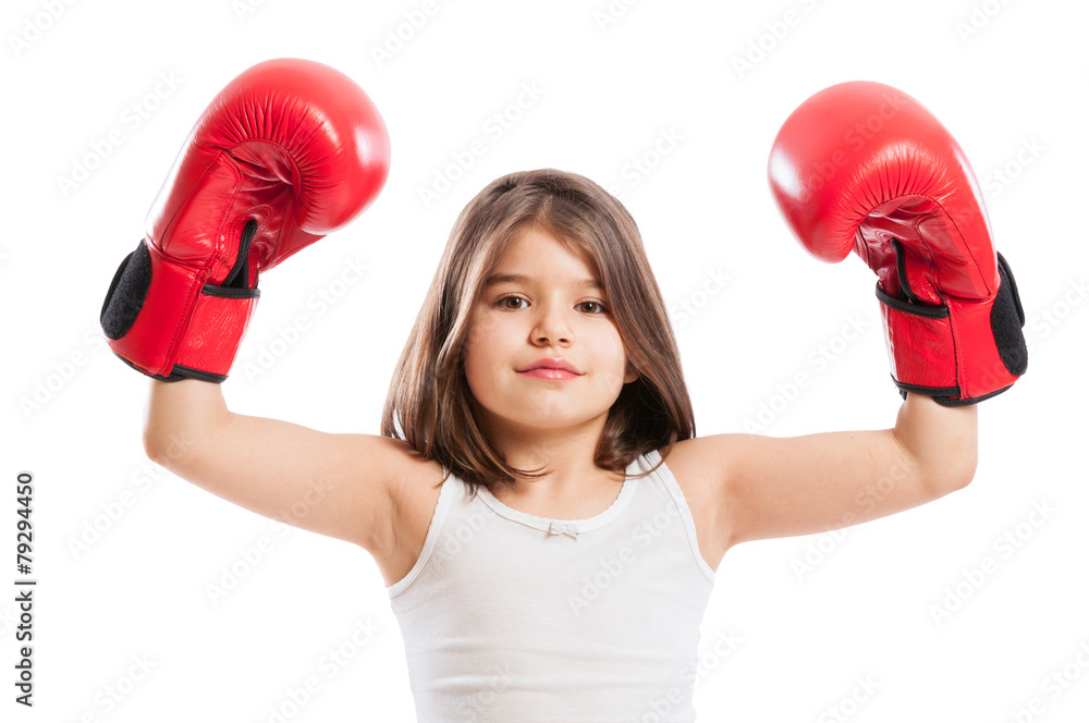 Young boxer girl raising arms up Young boxer girl raising arms up