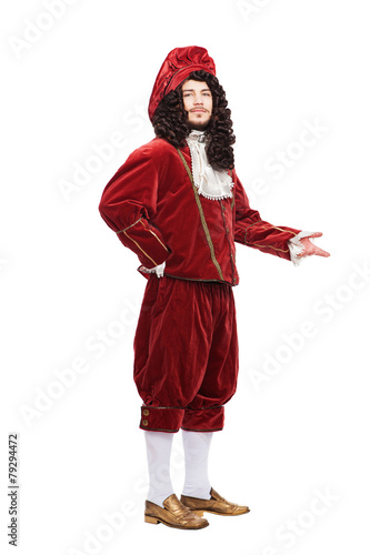 Portrait of the Middle Ages man in red costume isolated on white