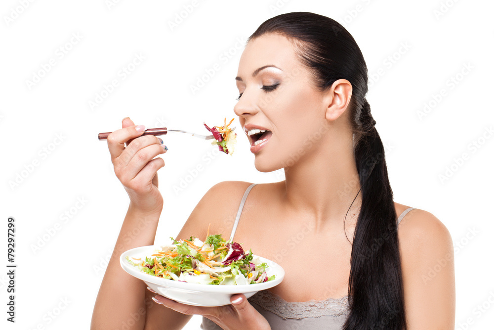 Healthy lifestyle - young woman eating salad Healthy lifestyle - young woman eating salad