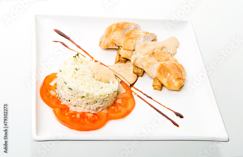 chicken roll with rice and tomatoes