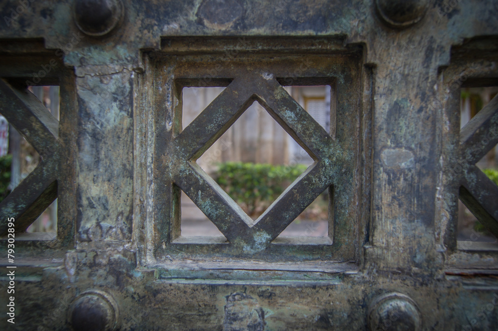 Rusty green iron gates