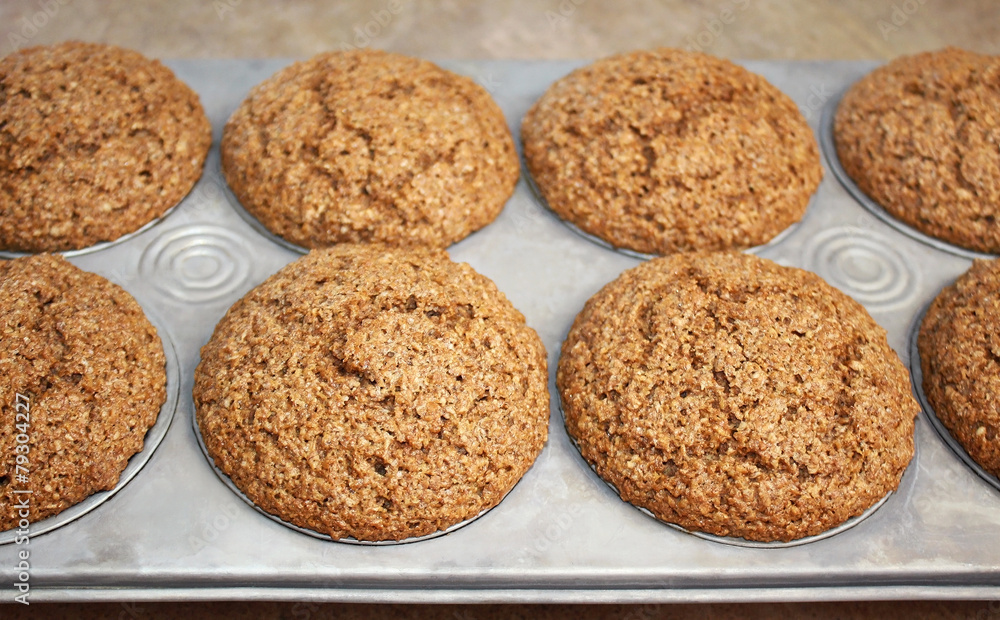 Hot out of the oven - Homemade Bran Muffins in baking pan Hot out of the oven - Homemade Bran Muffins in baking pan