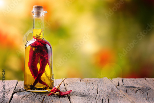 Chilli oil on wooden table