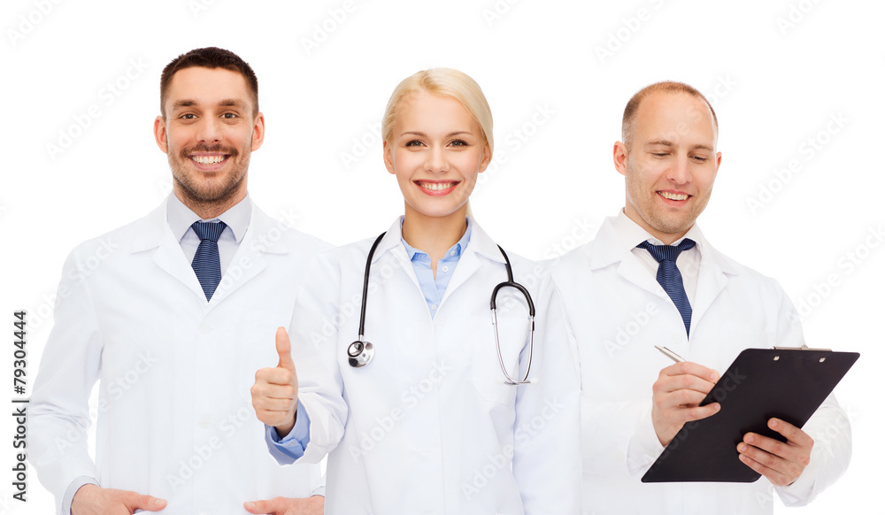 group of doctors showing thumbs up over white group of doctors showing thumbs up over white