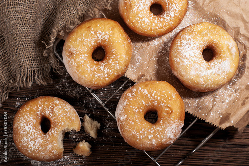 Homemade donuts on a wooden table