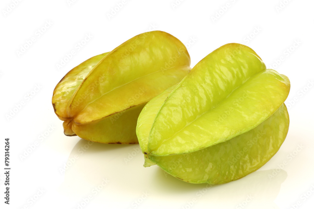 fresh green starfruit on a white background fresh green starfruit on a white background