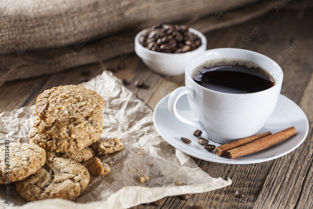 Delicious coffee with sweets on a wooden table Delicious coffee with sweets on a wooden table