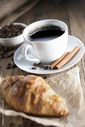 Fototapeta Naklejka Na Ścianę i Meble -  Delicious coffee with sweets on a wooden table
