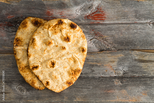 Simply delicious baked naan flatbreads on Picnic Table