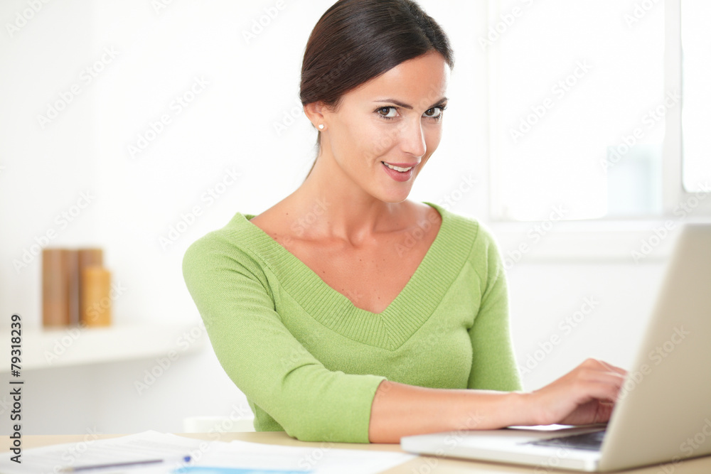 Lovely lady working on her laptop Lovely lady working on her laptop