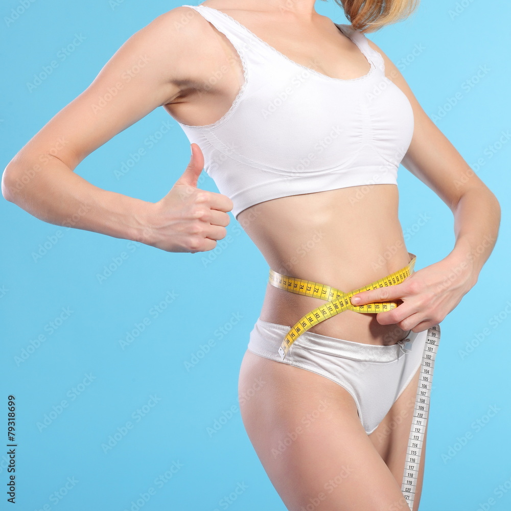 woman with measure tape over white woman with measure tape over white