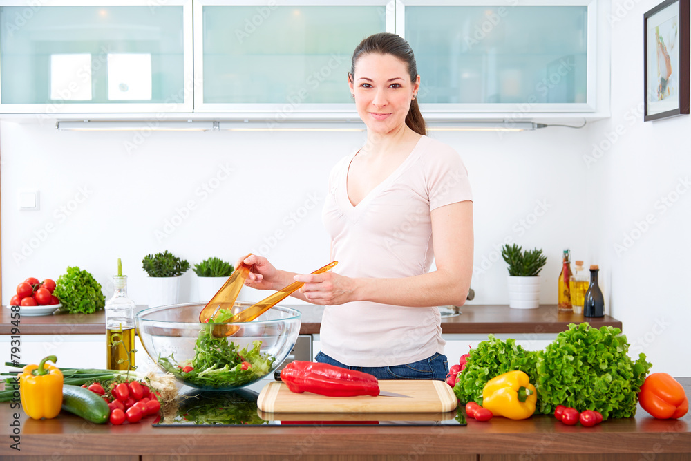 Young woman in the kitchen prepare salad VII Young woman in the kitchen prepare salad VII