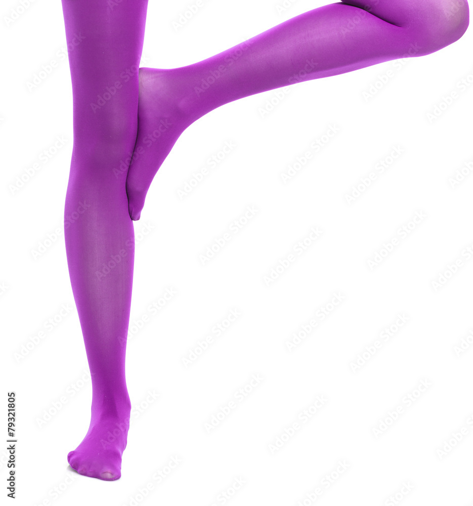 Woman slim legs and violet stockings isolated Woman slim legs and violet stockings isolated