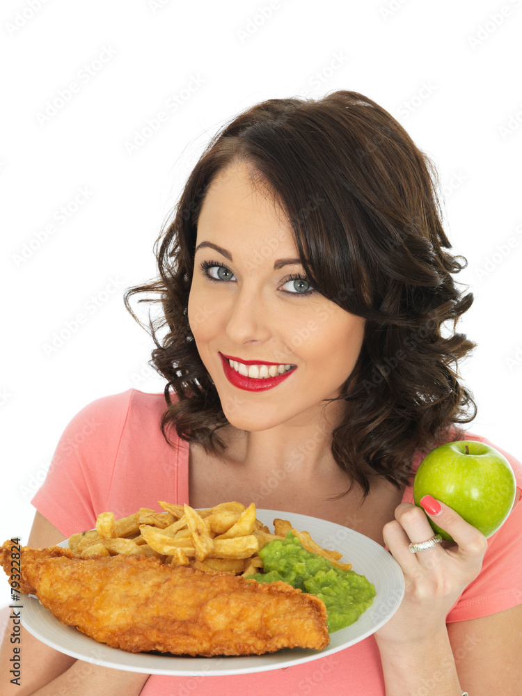 Young Woman Eating Fish and Chips with Mushy Peas Young Woman Eating Fish and Chips with Mushy Peas