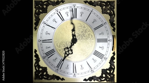 Clock face running backward at speed ornate grandfather time tra photo