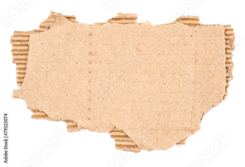 old textured cardboard sheet with torn edges isolated over white
