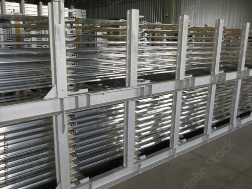 Aluminum lines stock rack in a factory.