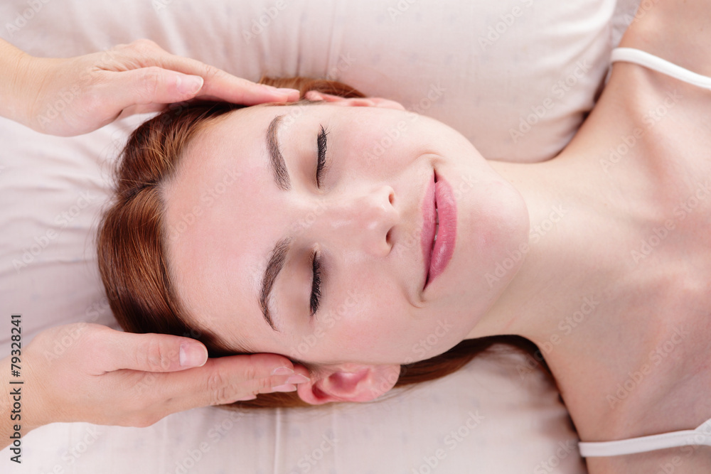 young woman enjoy face massage