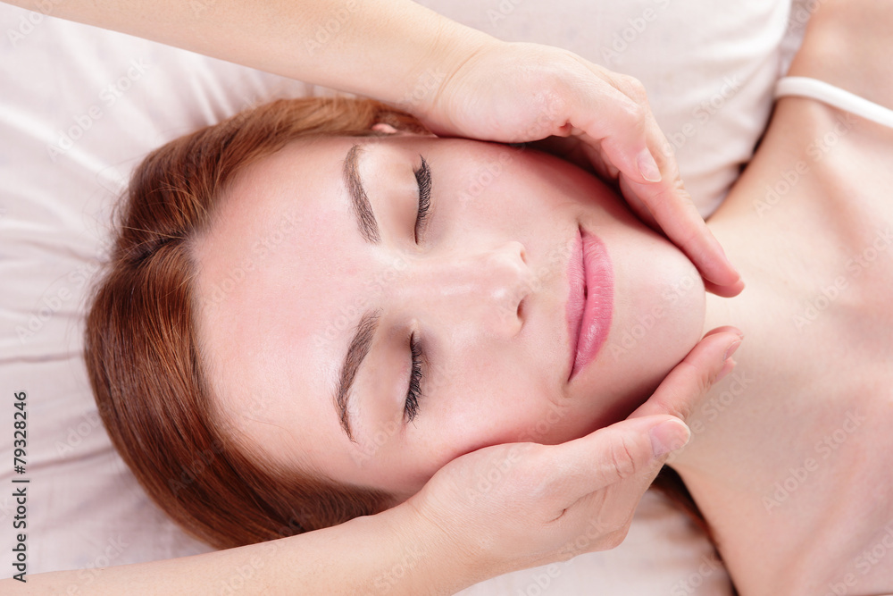 young woman enjoy face massage young woman enjoy face massage