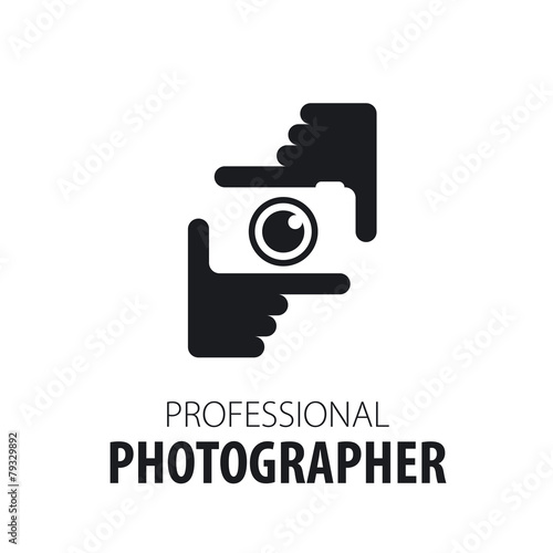 logo camera in the hands of the photographer