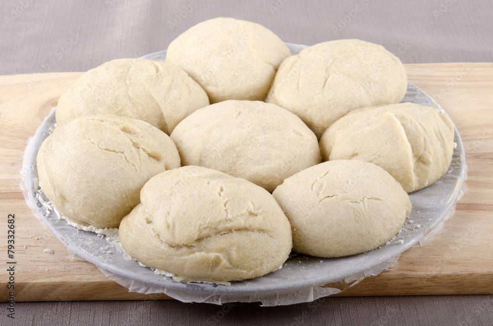 freshly baked rolls on baking tray