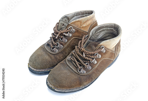 Old work boots isolated on white