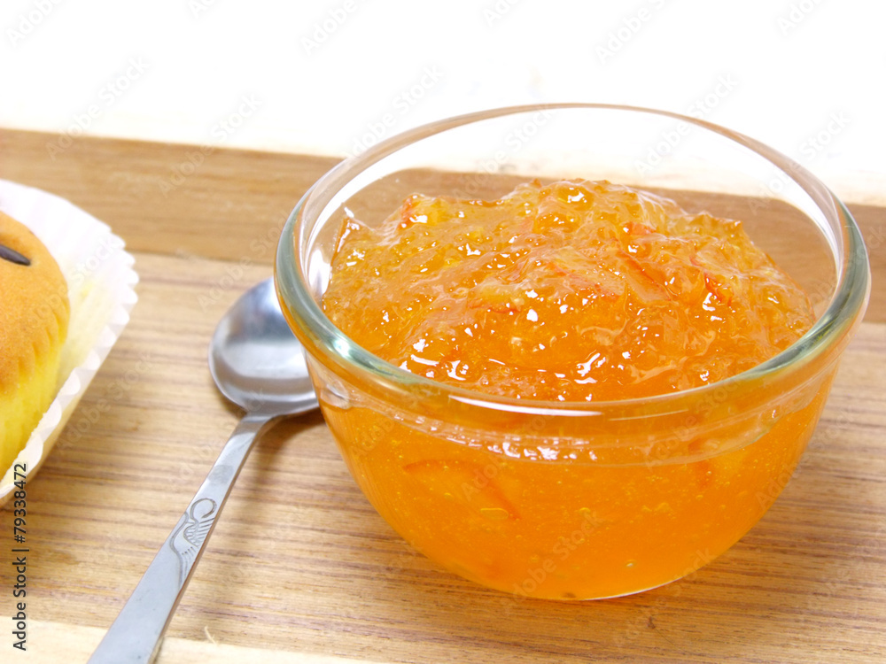 orange jam in glass isolation on white background orange jam in glass isolation on white background