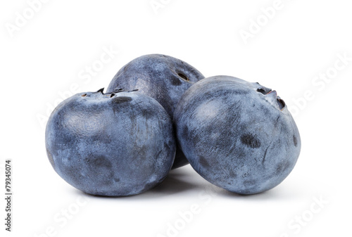 three ripe blueberries