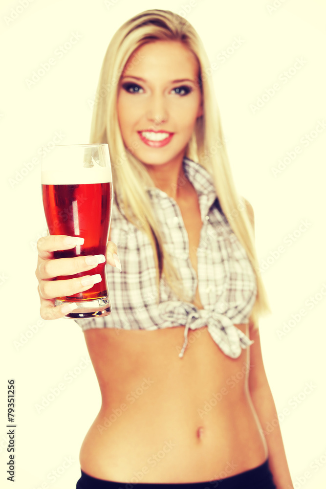 Beautiful young woman drinking beer. Beautiful young woman drinking beer.