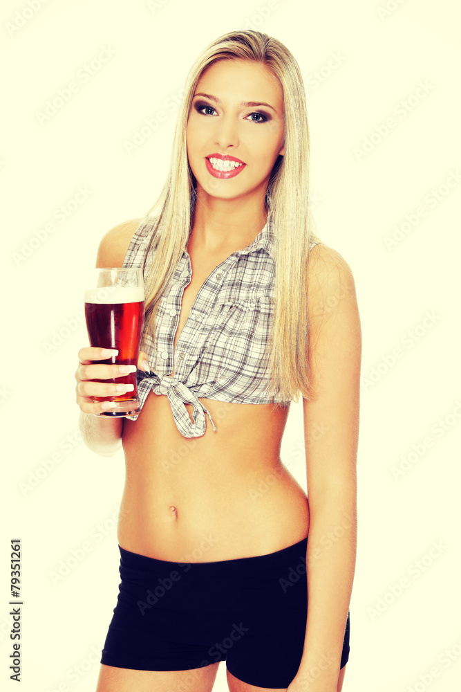 Beautiful young woman drinking beer. Beautiful young woman drinking beer.