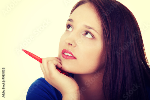 Student woman with pen.