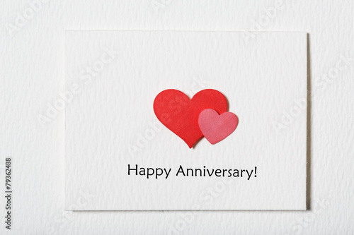 Happy anniversary message card with hearts
