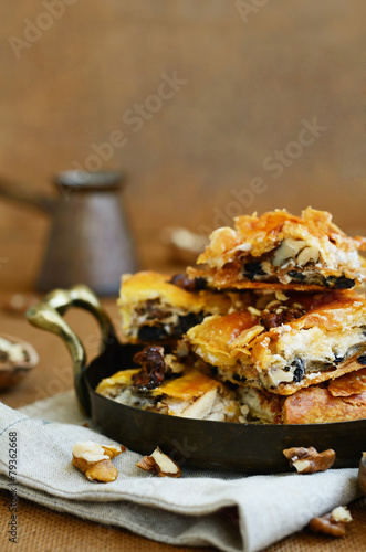 Tray with baklava - Turkish sweet with honey, walnut and raisin