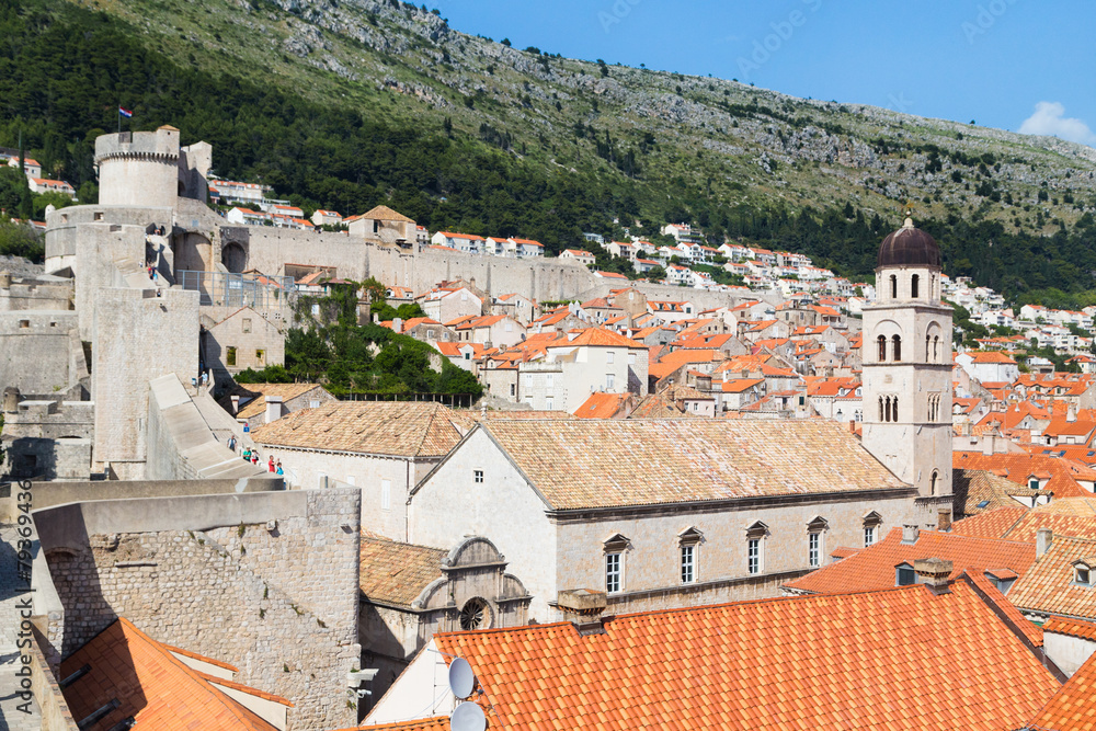 DUBROVNIK, CROATIA - MAY 26, 2014: View on Old city rooftops and Srdj hill in the background.
