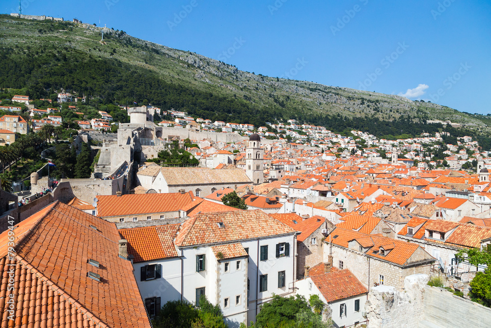 DUBROVNIK, CROATIA - MAY 26, 2014: View on Old city rooftops and Srdj hill in the background.