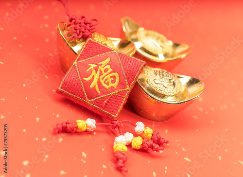 Traditional chinese knot on red background photo