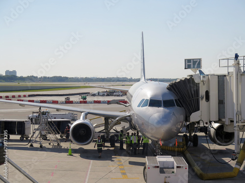 Aerobridge in plane parked in the airport waiting for passengers