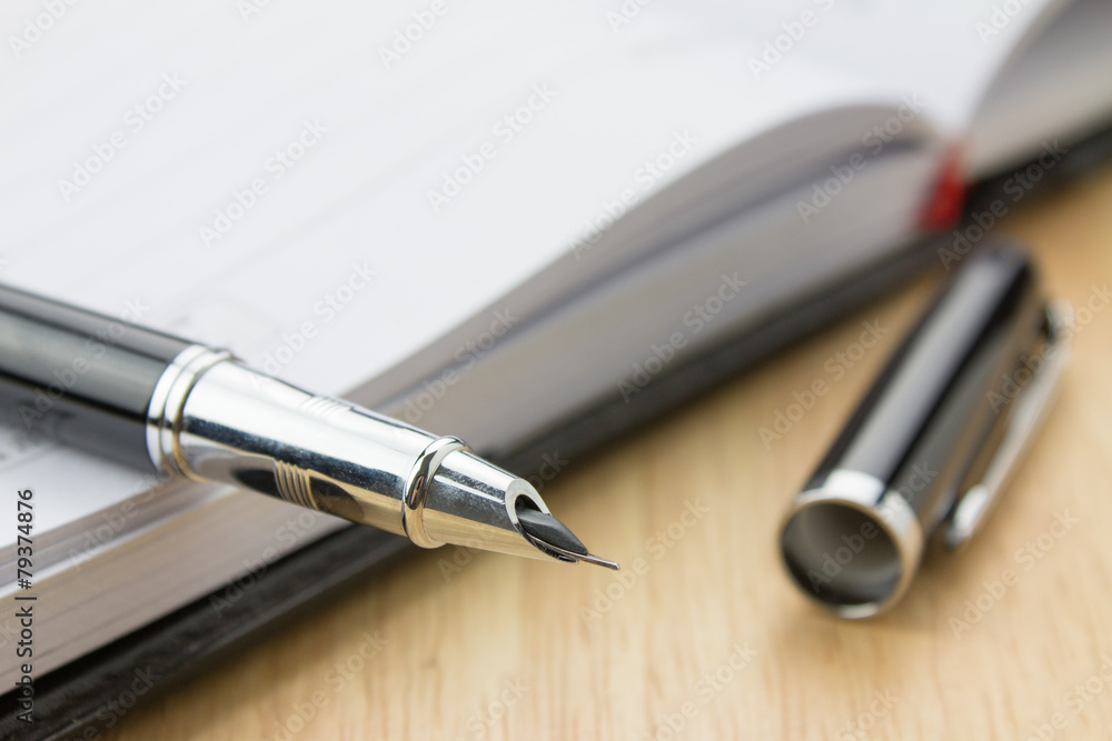 Fountain pen in a notebook Fountain pen in a notebook