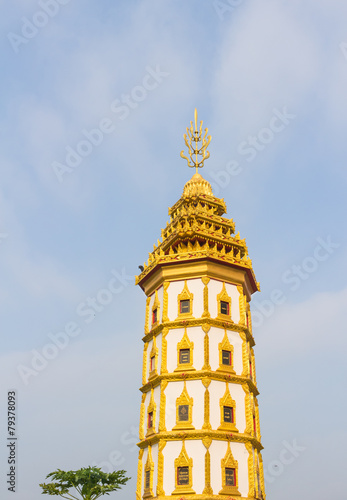 the gold stupa with sky background at Wat Phueng Daet photo