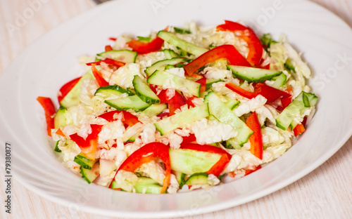 Chinese cabbage salad with red bell pepper and cucumber