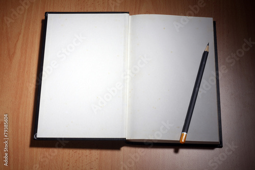 pencil on the note book