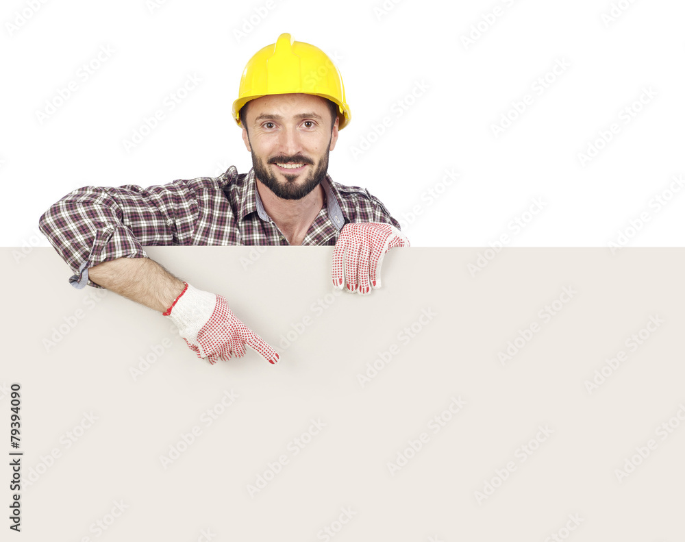 Carpenter pointing at blank board Carpenter pointing at blank board