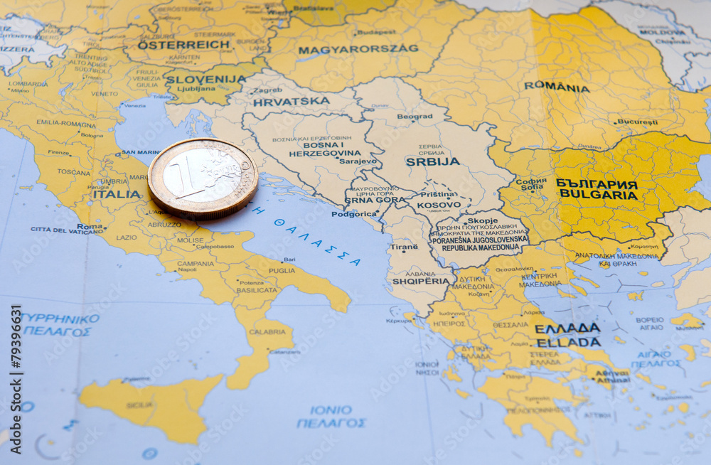Euro coin on European map Euro coin on European map