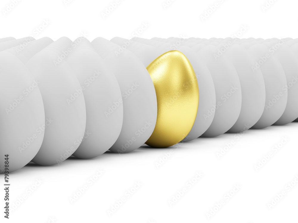 Easter Concept. Golden Easter Egg standing out from the others Easter Concept. Golden Easter Egg standing out from the others