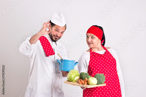 Italian Chiefcook in Red Apron Shows OK Sign photo