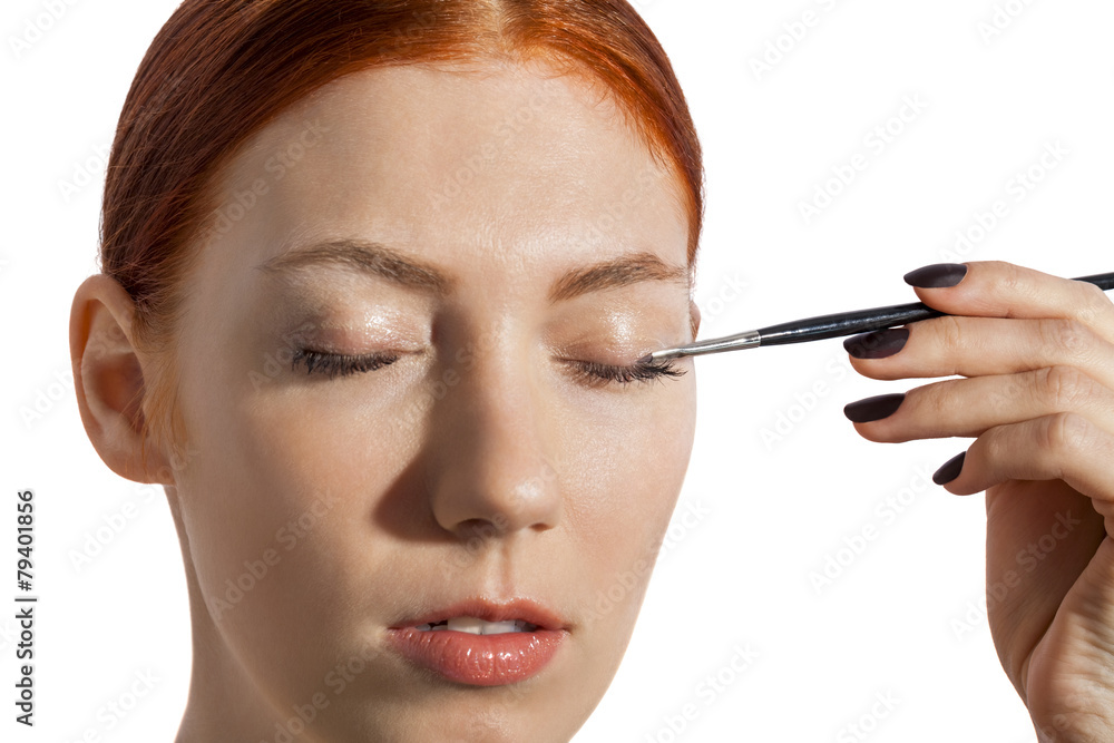 Pretty Woman Applying Eye Shadow Makeup