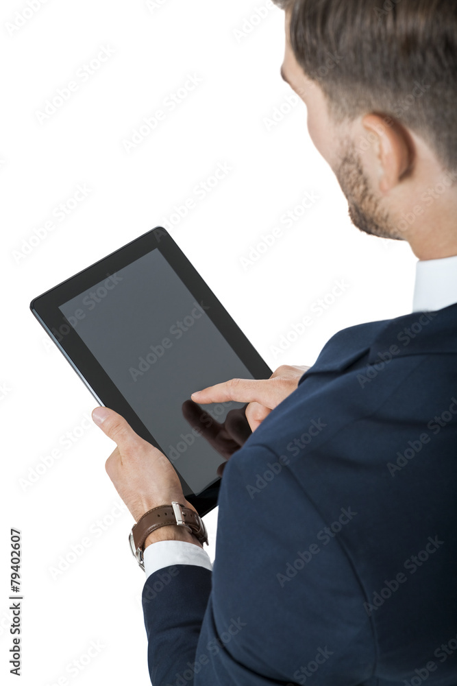 Businessman using a tablet computer Businessman using a tablet computer